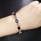 NHXIH1484094-Sapphire-Rose-Gold