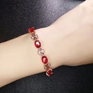 NHXIH1484096-red-stone-rose-gold