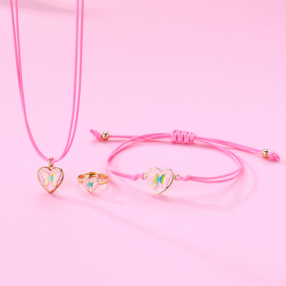 Estilo de dibujos animados Lindo Romántico Forma De Corazón Mariposa Aleación línea de cera Esmalte Hecho A Mano Chapado En Oro K. niños unisex Conjunto De Joyas